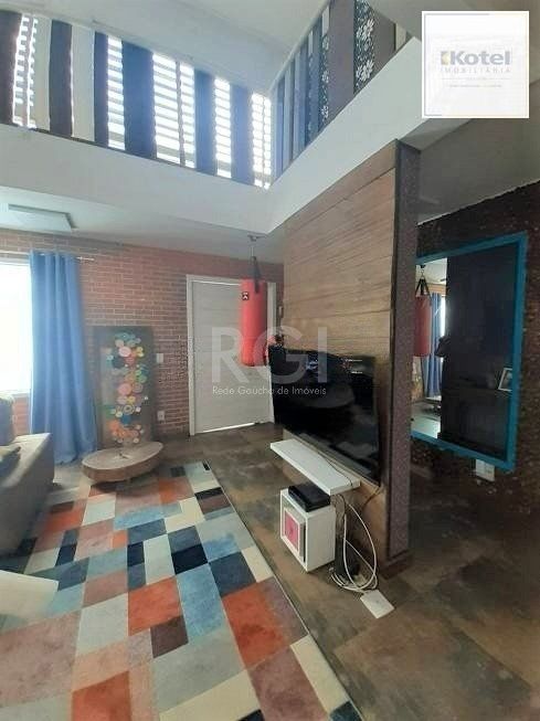 Casa com 233m², 2 dormitórios sendo 1 suíte, living com lareira, espaço gourmet com churrasqueira, pátio e 2 vagas de garagem no bairro Sarandi — foto 4