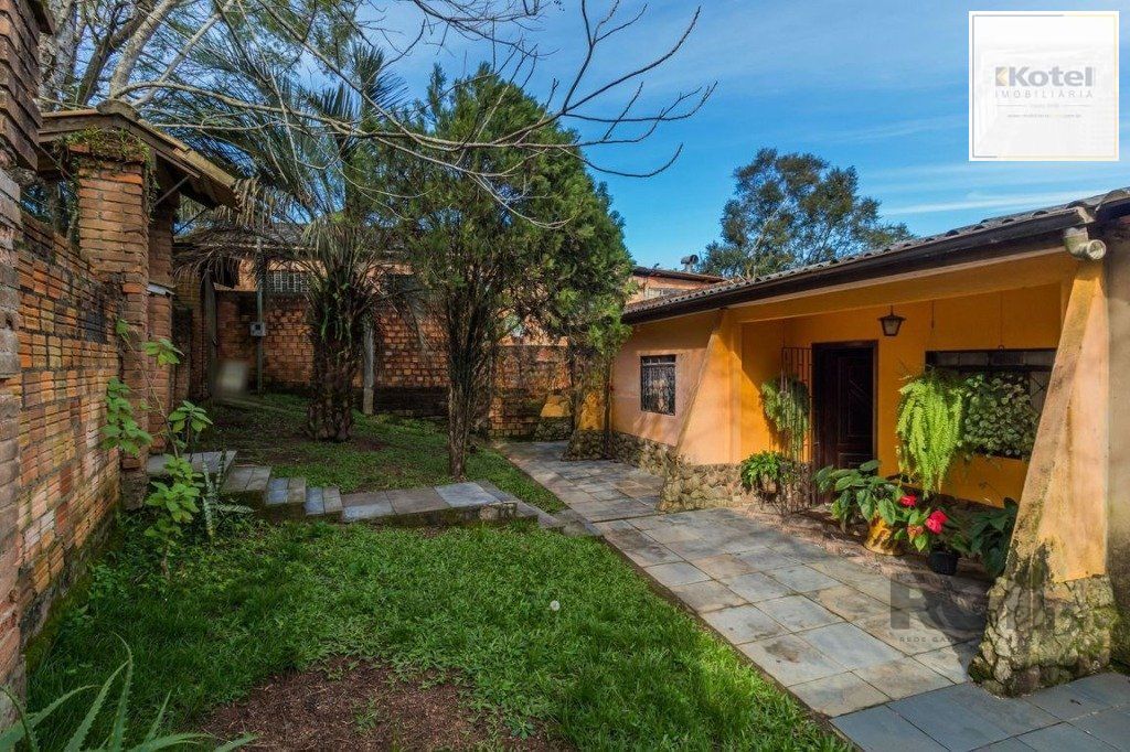 Casa de 3 dormitórios no bairro  Lomba do Pinheiro — foto 3