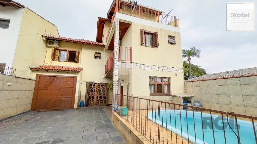 Casa com 4 quartos no bairro nonoai — foto 4