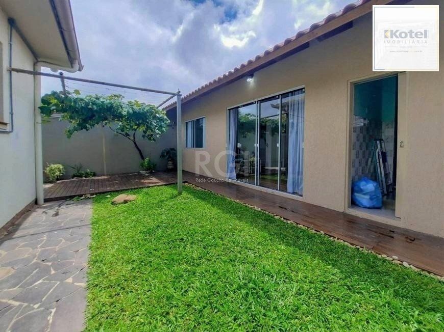 Excelente casa com 3 dormitórios e 3 vagas de garagem — foto 5