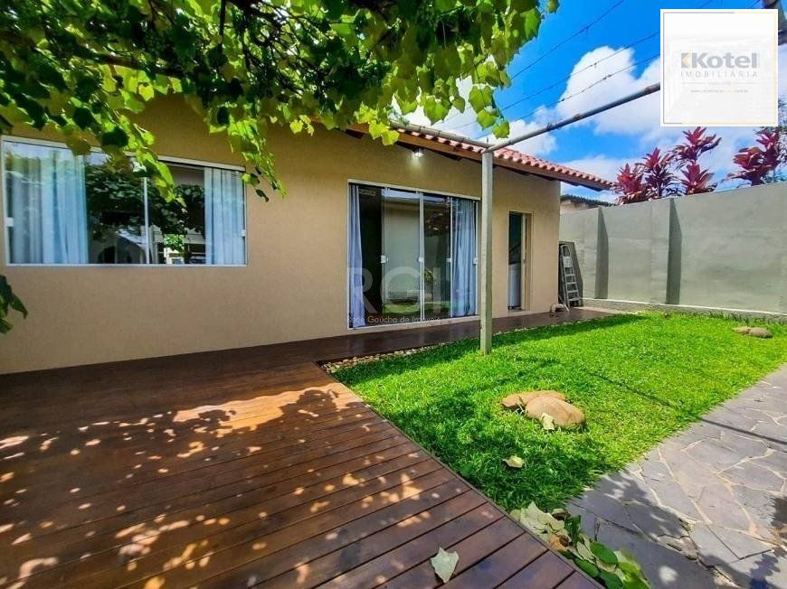 Excelente casa com 3 dormitórios e 3 vagas de garagem — foto 3