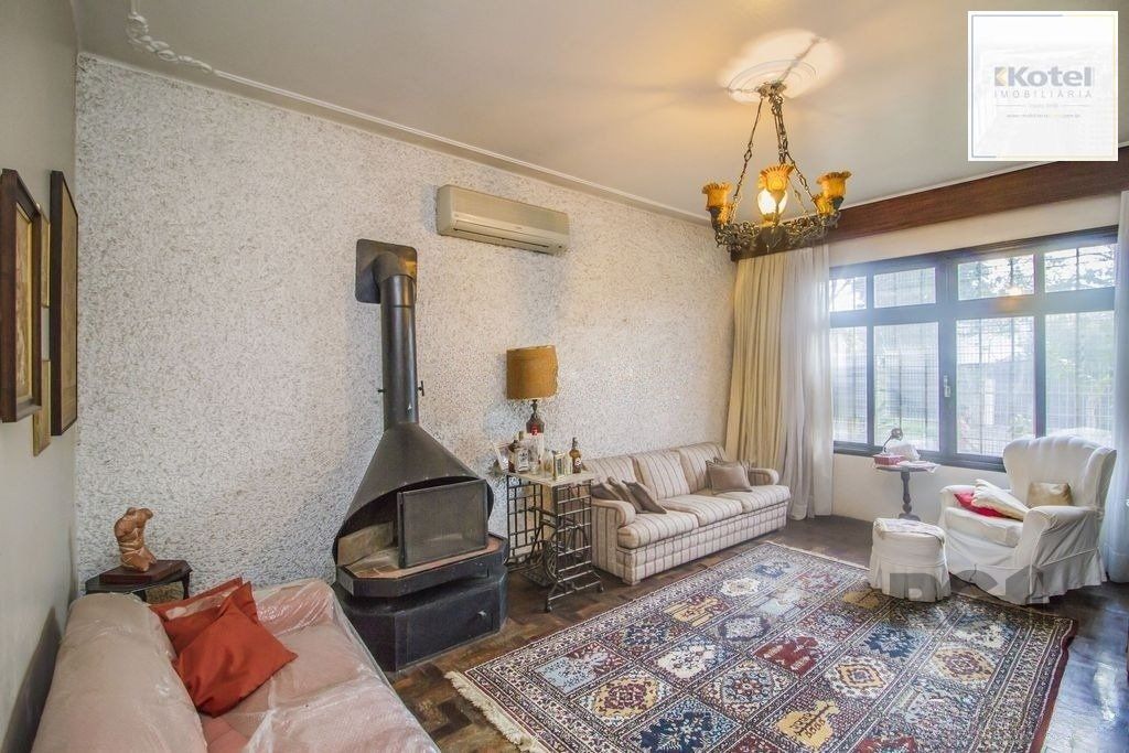 Casa de 4 dormitórios, bairro Santa Tereza — foto 2