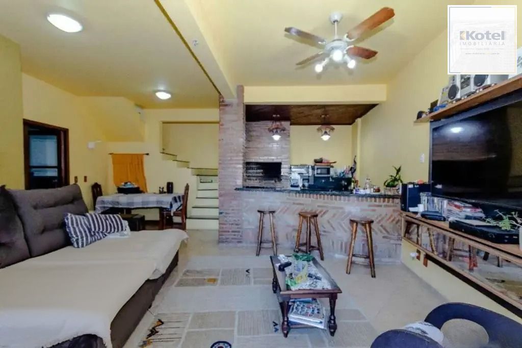 Casa à venda com 3 dormitórios, 1 suíte e espaço gourmet em terreno alto — foto 2