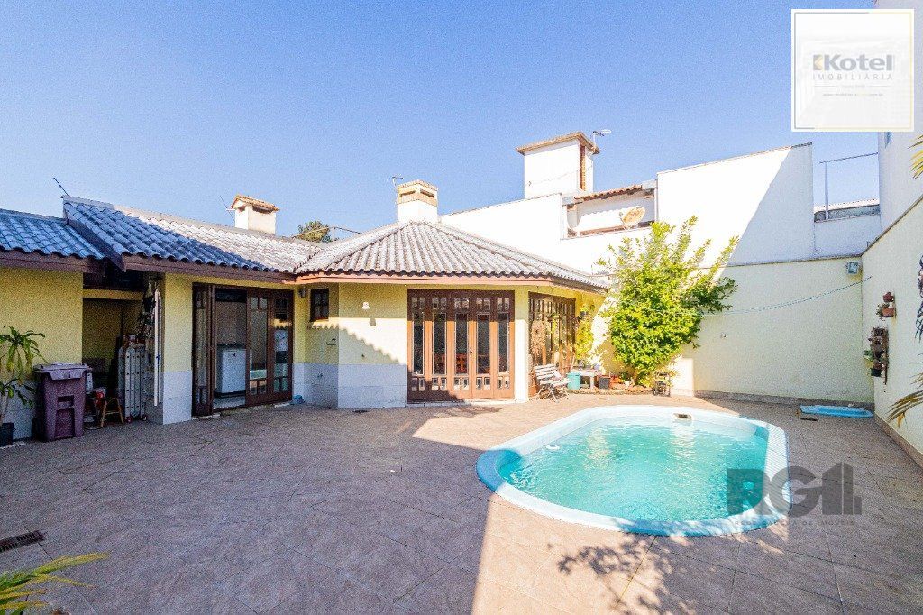 Casa de 4 dormitórios 304m² no bairro Jardim Lindóia — foto 4