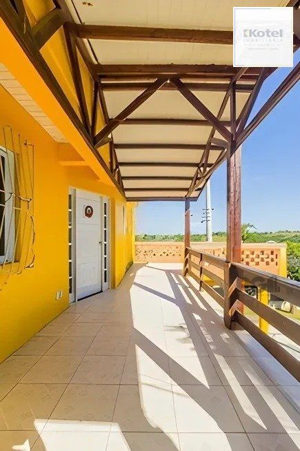 casa de 4 dormitórios,  no bairro Lomba do Pinheiro — foto 4