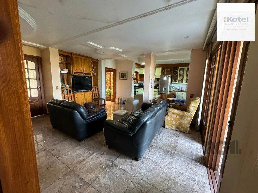 Casa com 4 dormitórios no bairro nonoai — foto 3