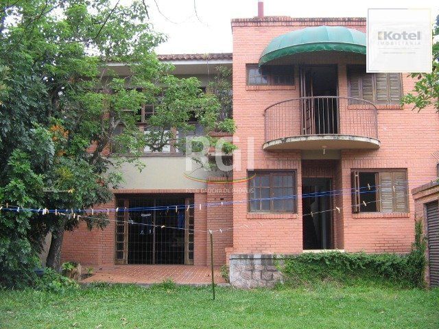 Casa para Venda - 260m², 3 dormitórios, sendo 1 suites, 7 vagas - Nonoai — foto 3