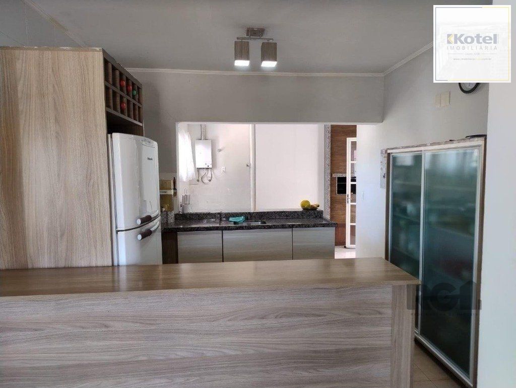 Casa de 3 dormitórios no bairro Mário Quintana — foto 4
