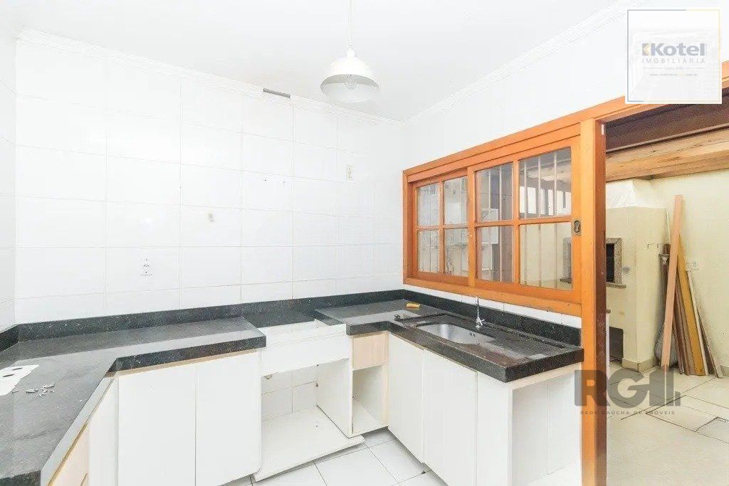 Casa com 3 dormitórios no bairro Jardim Itu — foto 4