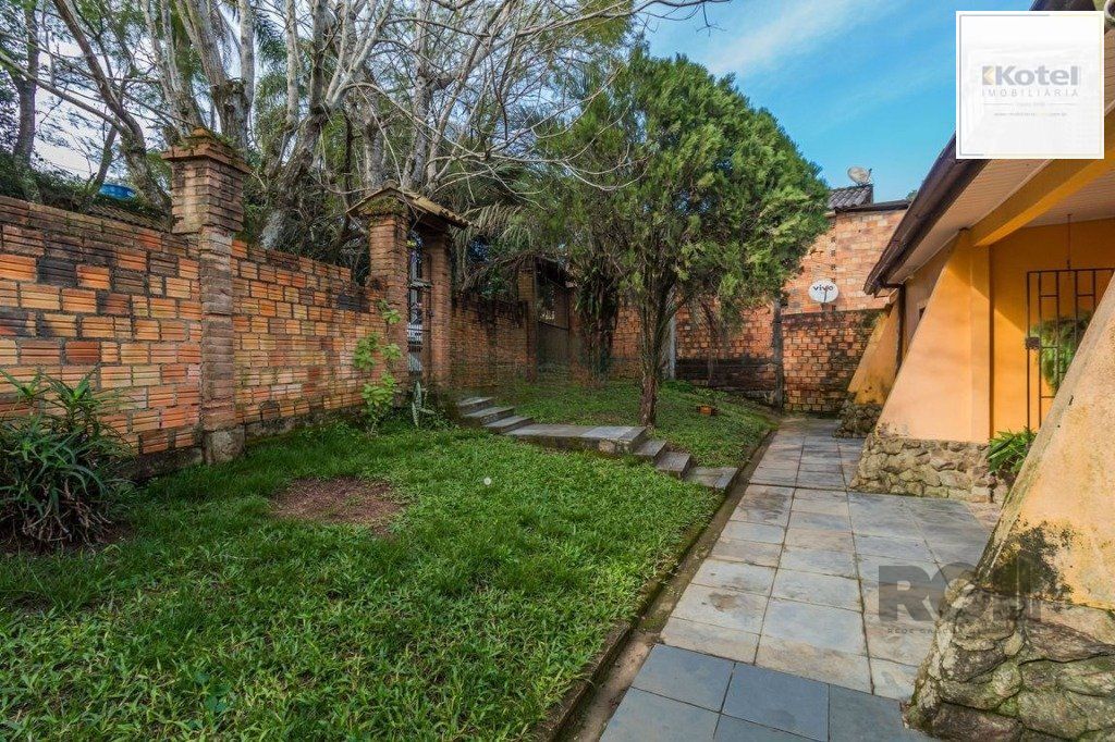 Casa de 3 dormitórios no bairro  Lomba do Pinheiro — foto 4