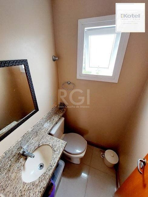 Casa com 03 dormitórios, 01 suíte, pátio com churrasqueira e 03 vagas de garagem no bairro Tristeza — foto 4