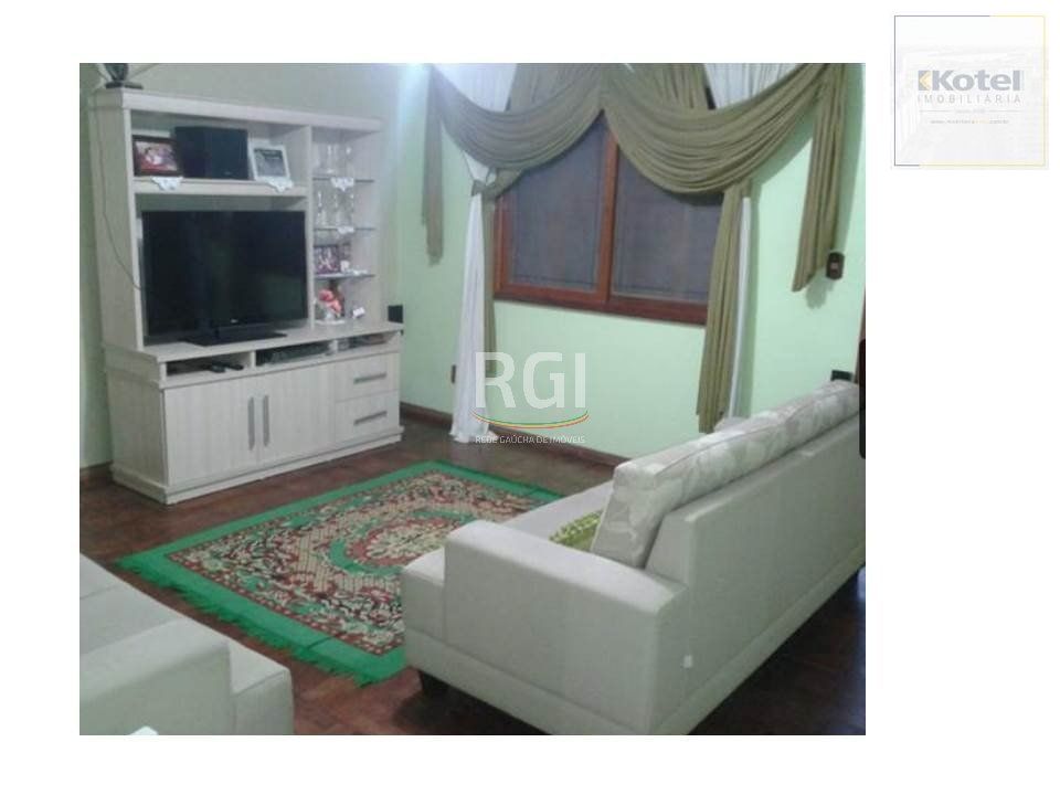 Casa para Venda - 634m², 2 dormitórios, sendo 1 suites, 3 vagas - Lomba do Pinheiro — foto 3