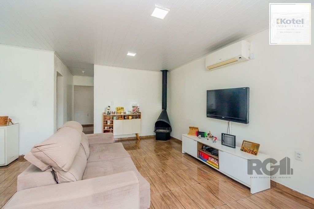 Casa de 2 dormitórios com 98m² no Bairro Lomba do Pinheiro — foto 2
