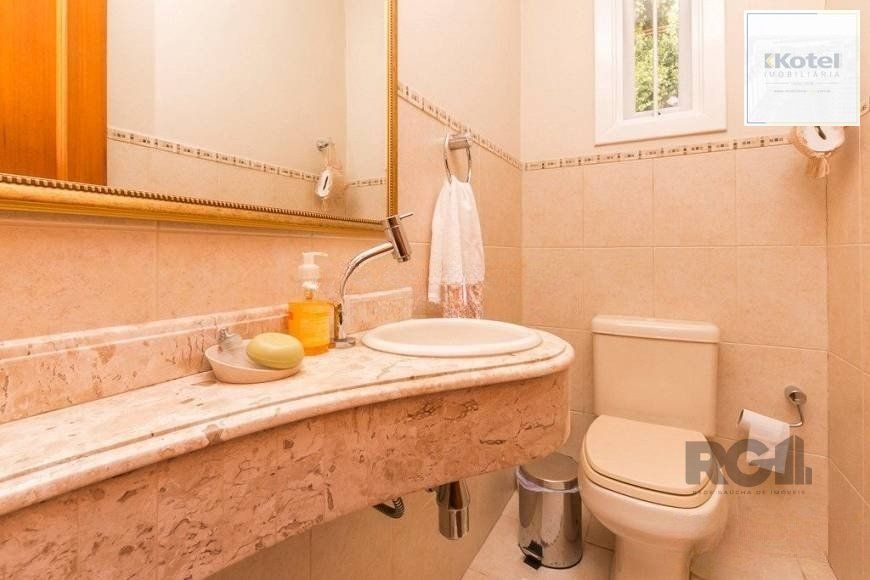 Casa de 380m² - 4 dormitórios, 2 suítes, 4 vagas no bairro Bom Jesus — foto 5