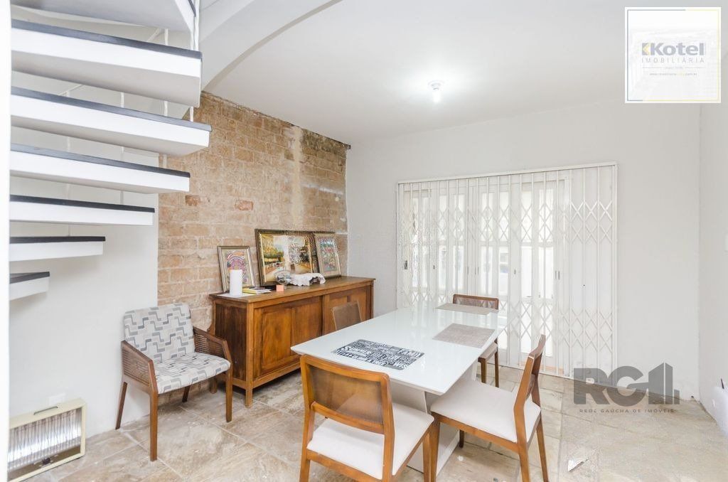 Casa de 4 dormitórios no bairro Três Figueiras — foto 2