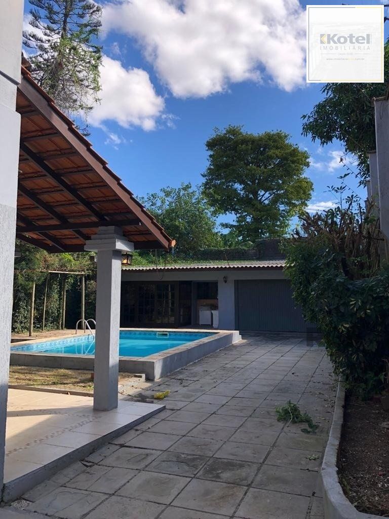 Casa de 365m² - 4 dormitórios sendo 3 suítes e 5 vagas de garagem no bairro Partenon — foto 3