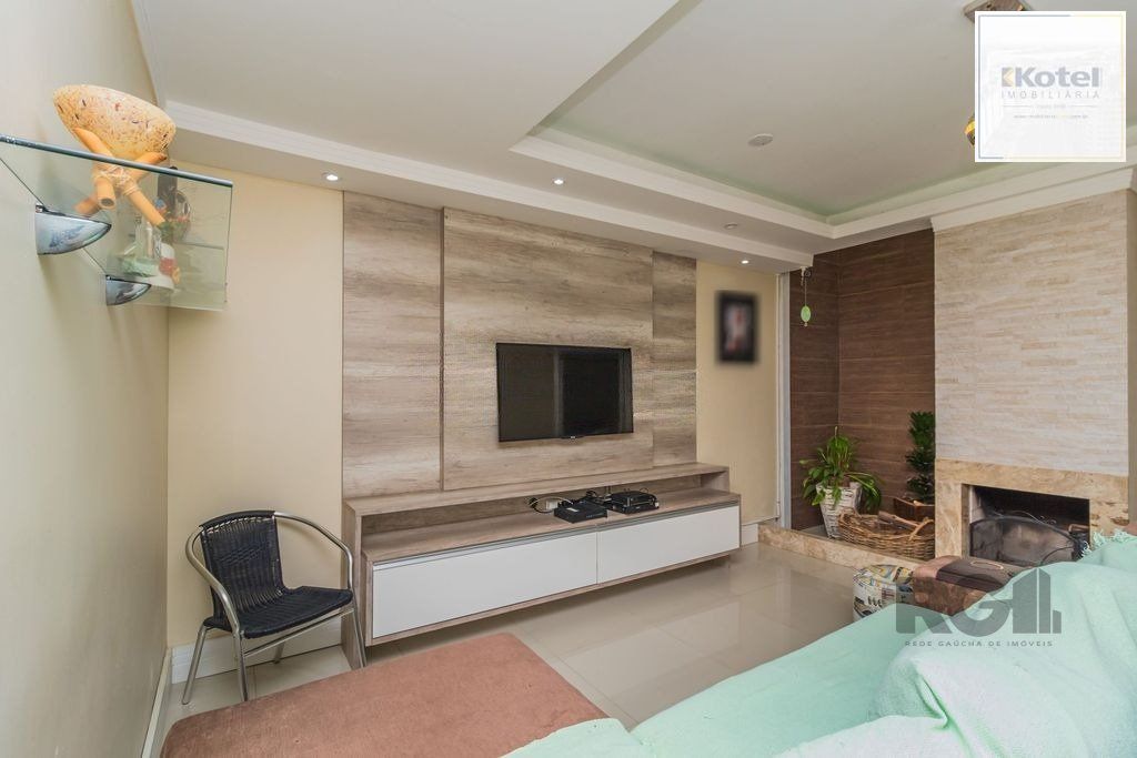 Casa de 3 dormitórios no bairro Guarujá — foto 2