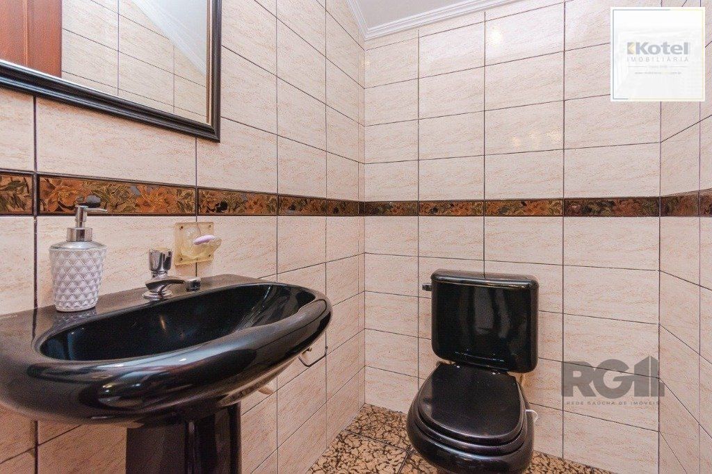 Casa com 4 dormitórios no bairro Morro Santana — foto 3