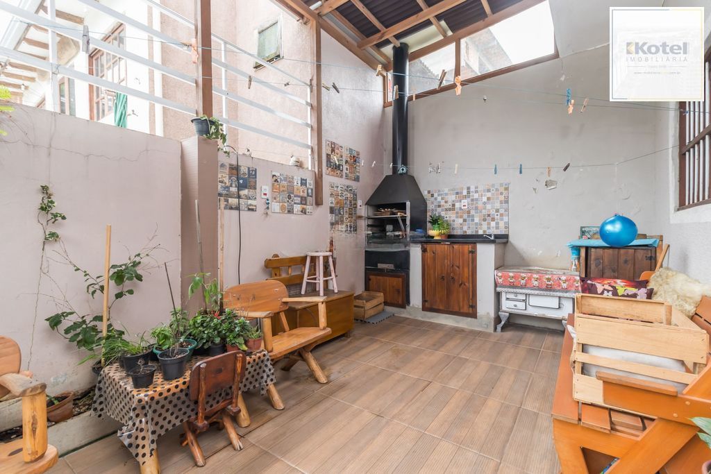 Casa de 6 dormitórios à venda Bairro Vila Nova - Porto Alegre — foto 2