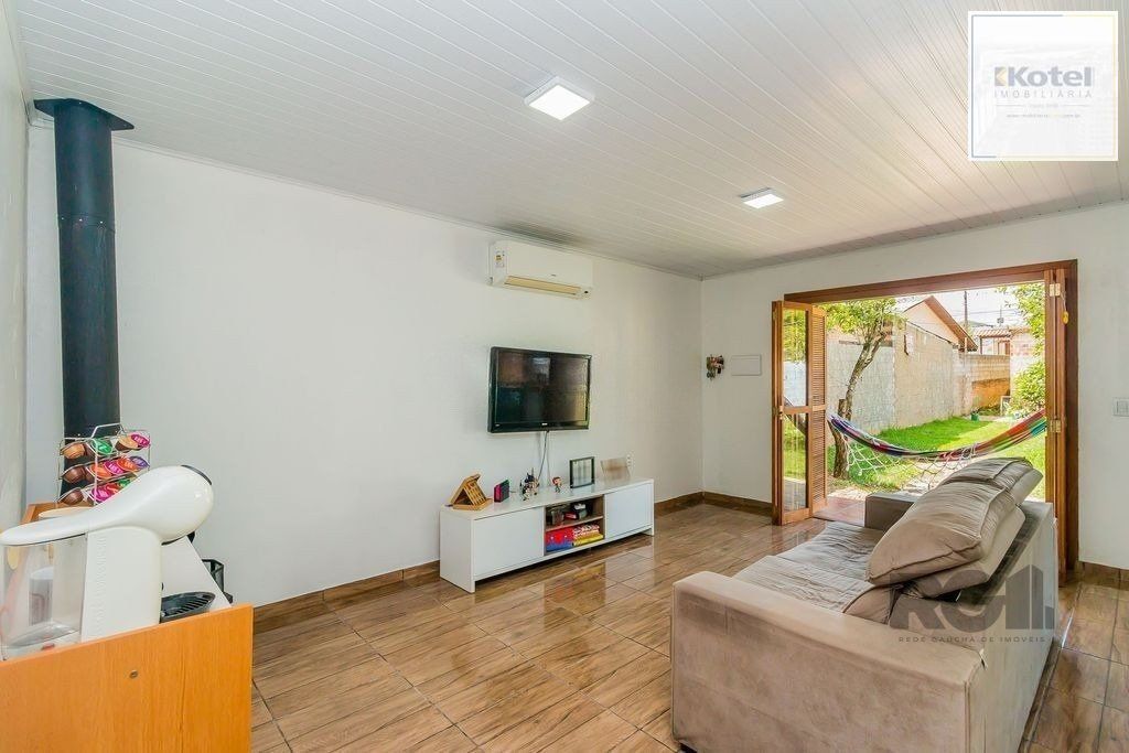 Casa de 2 dormitórios com 98m² no Bairro Lomba do Pinheiro — foto 4