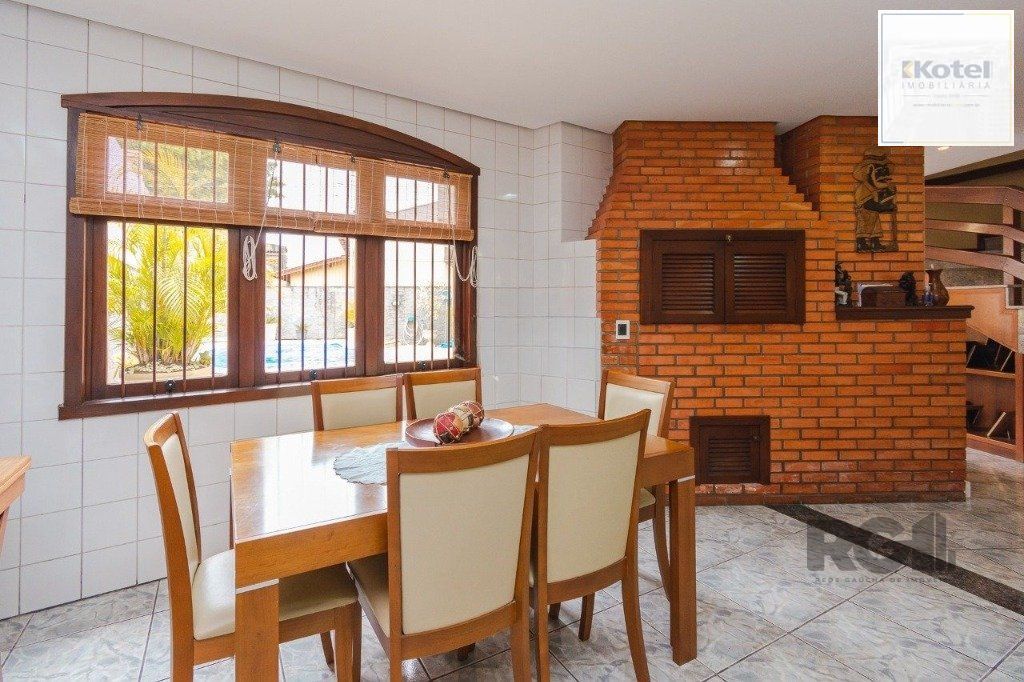 Casa com 4 dormitórios no bairro Morro Santana — foto 4