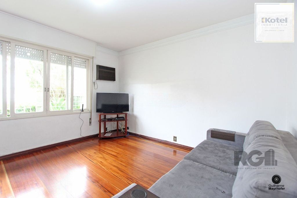 Casa com 5 suítes, 7 banheiros, 4 vagas no bairro Partenon — foto 3