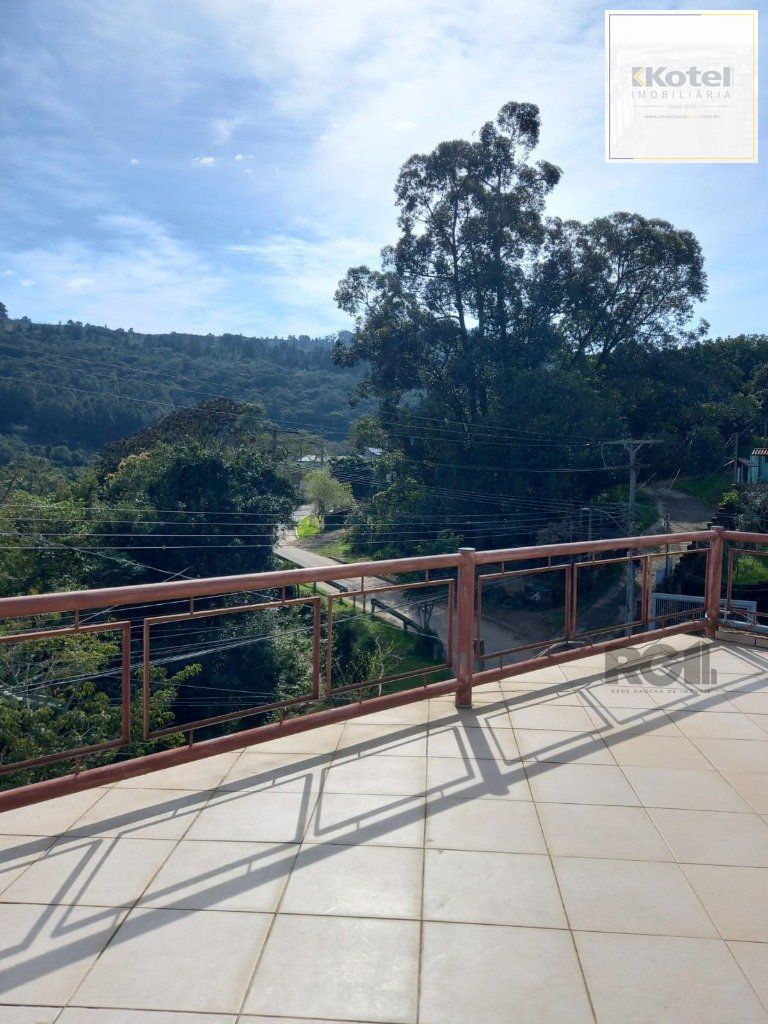 Casa com 4 dormitórios no bairro Vila Nova — foto 4