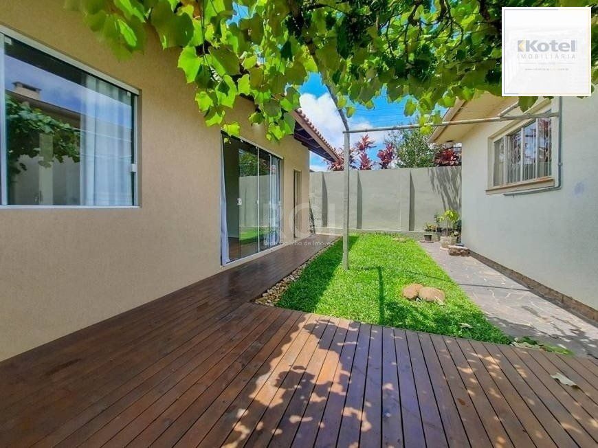 Excelente casa com 3 dormitórios e 3 vagas de garagem — foto 4