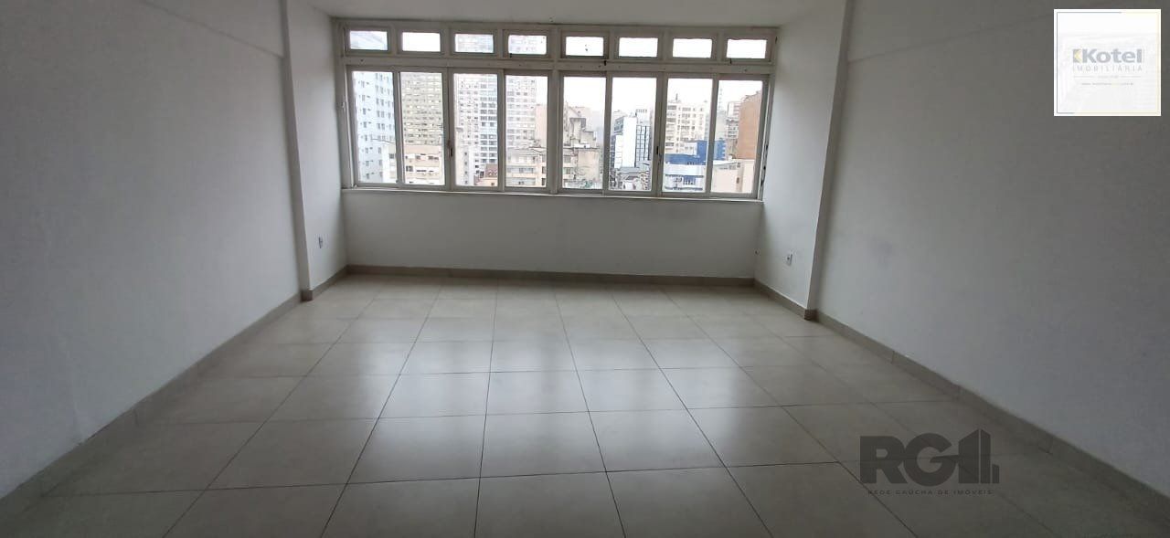 Sala em andar alto na região central.