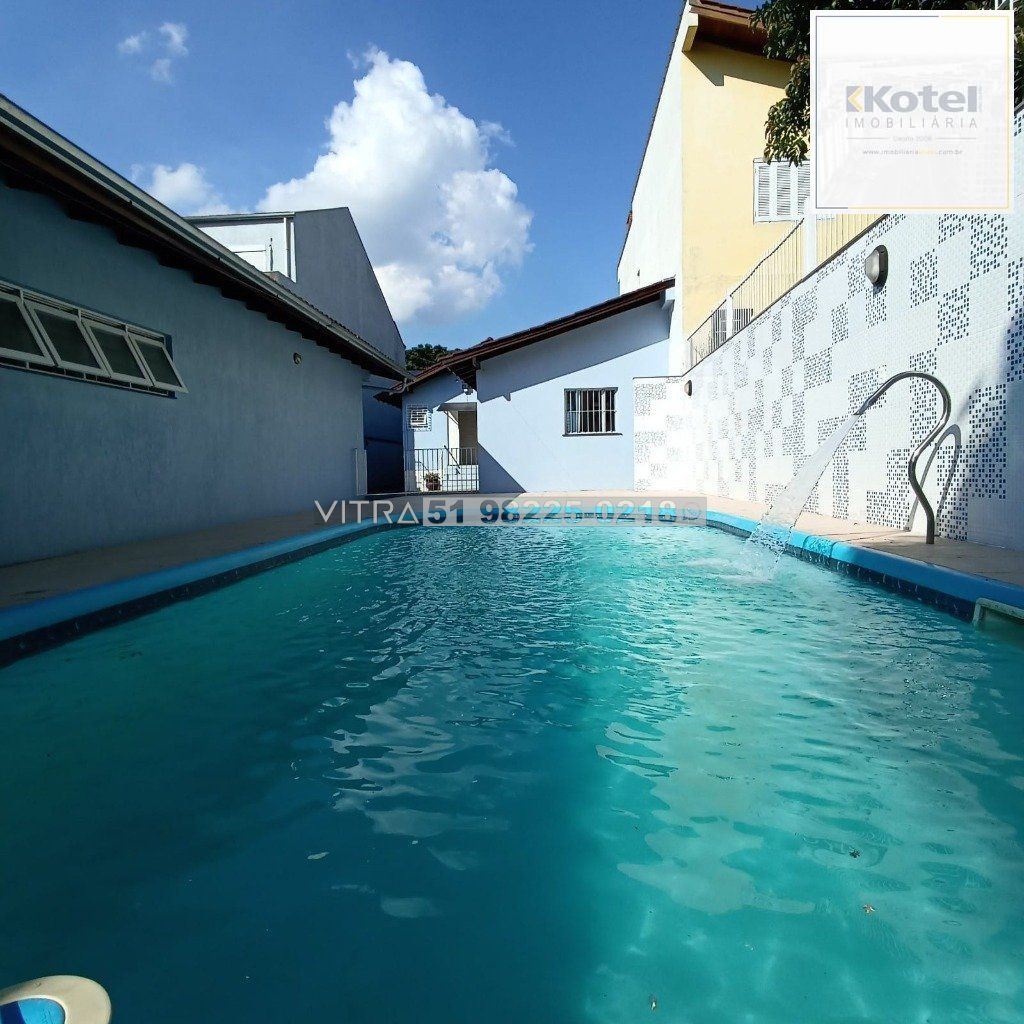 casa 04 dormitórios mais piscina e vagas cobertas — foto 2