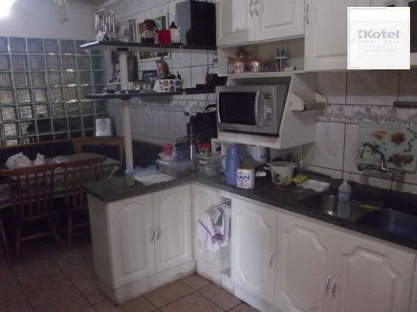 Casa com 03 quartos em terreno de 13:20 x 7501, no bairro Medianeira — foto 3