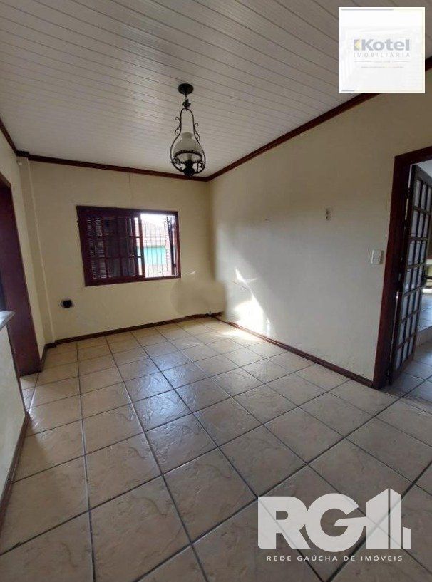 Linda Residência com cinco dormitórios no centro da cidade de Viamão/RS