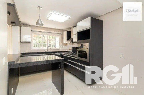 Ótima Residência com quatro dormitórios em Ipanema — foto 5