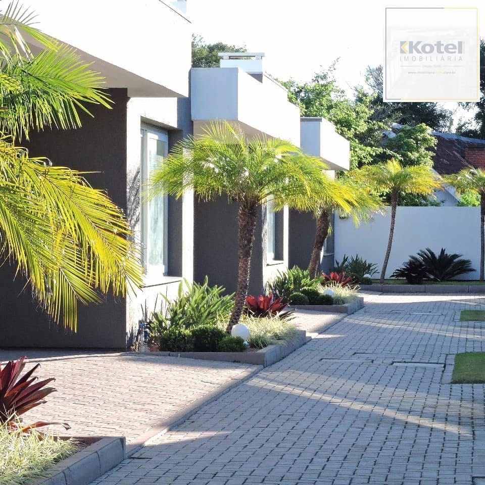 Exclusiva Casa Térrea com 3 Suítes em Condomínio Privativo no Bairro Guarujá — foto 3