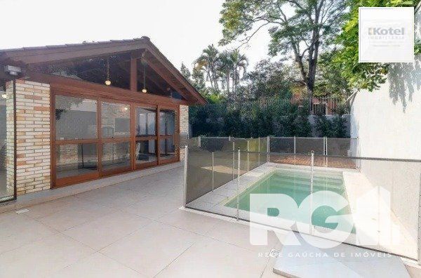 Ótima Residência com quatro dormitórios em Ipanema — foto 2