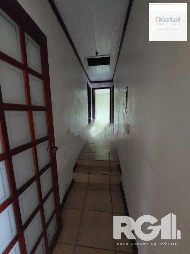 Linda Residência com cinco dormitórios no centro da cidade de Viamão/RS