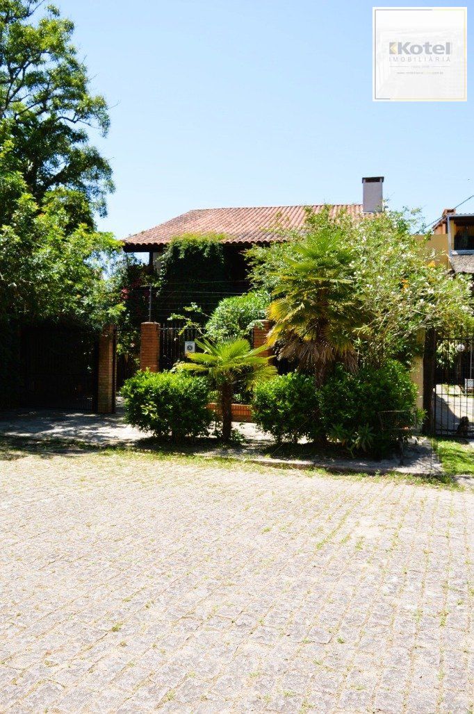 MAGNÍFICA MANSÃO ANOS 90 A BEIRA DO GUAÍBA NA ZONA SUL DE PORTO ALEGRE!