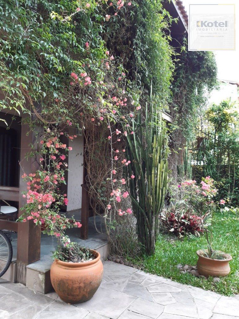 MAGNÍFICA MANSÃO ANOS 90 A BEIRA DO GUAÍBA NA ZONA SUL DE PORTO ALEGRE!