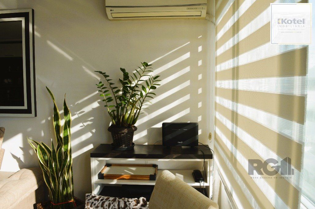 Impecável apto. 2 dormitórios -1 suíte, semimobiliado com linda vista e próximo ao Catamarã no Centro de Guaiba