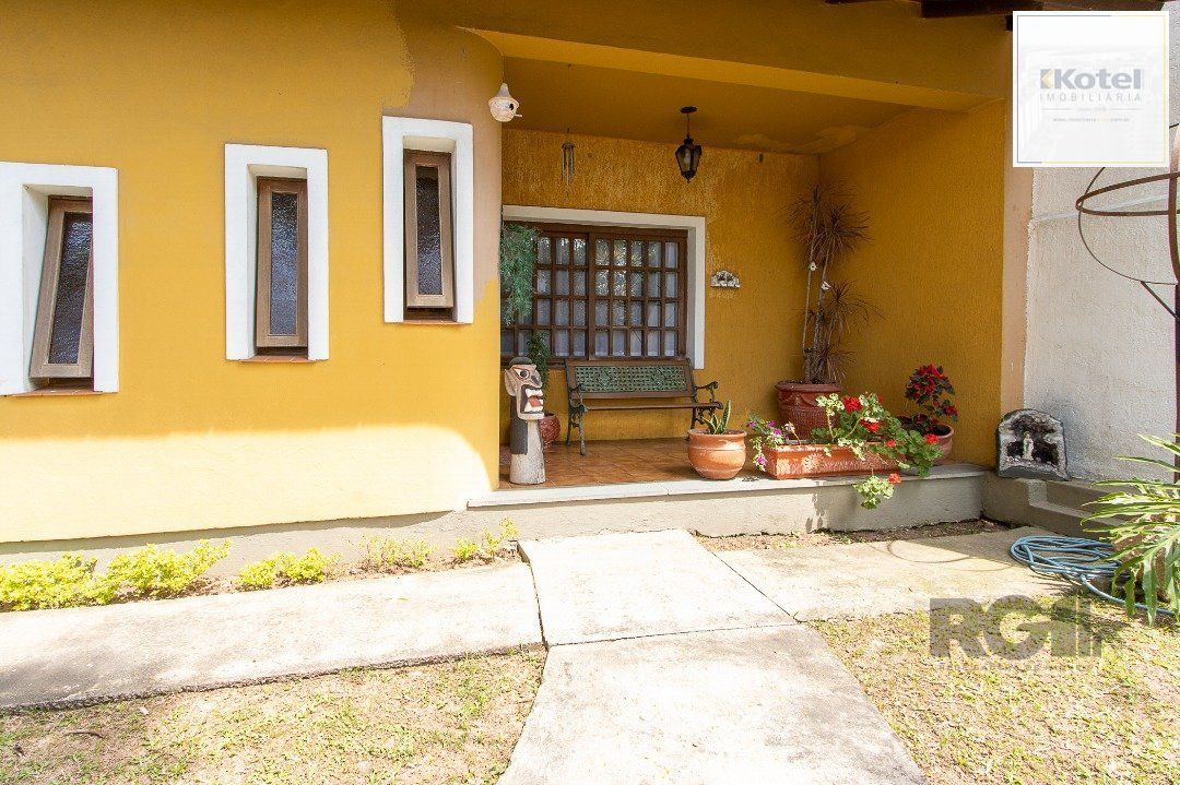 Casa para Venda - 300m², 3 dormitórios, sendo 1 suites, 4 vagas - Nonoai — foto 3