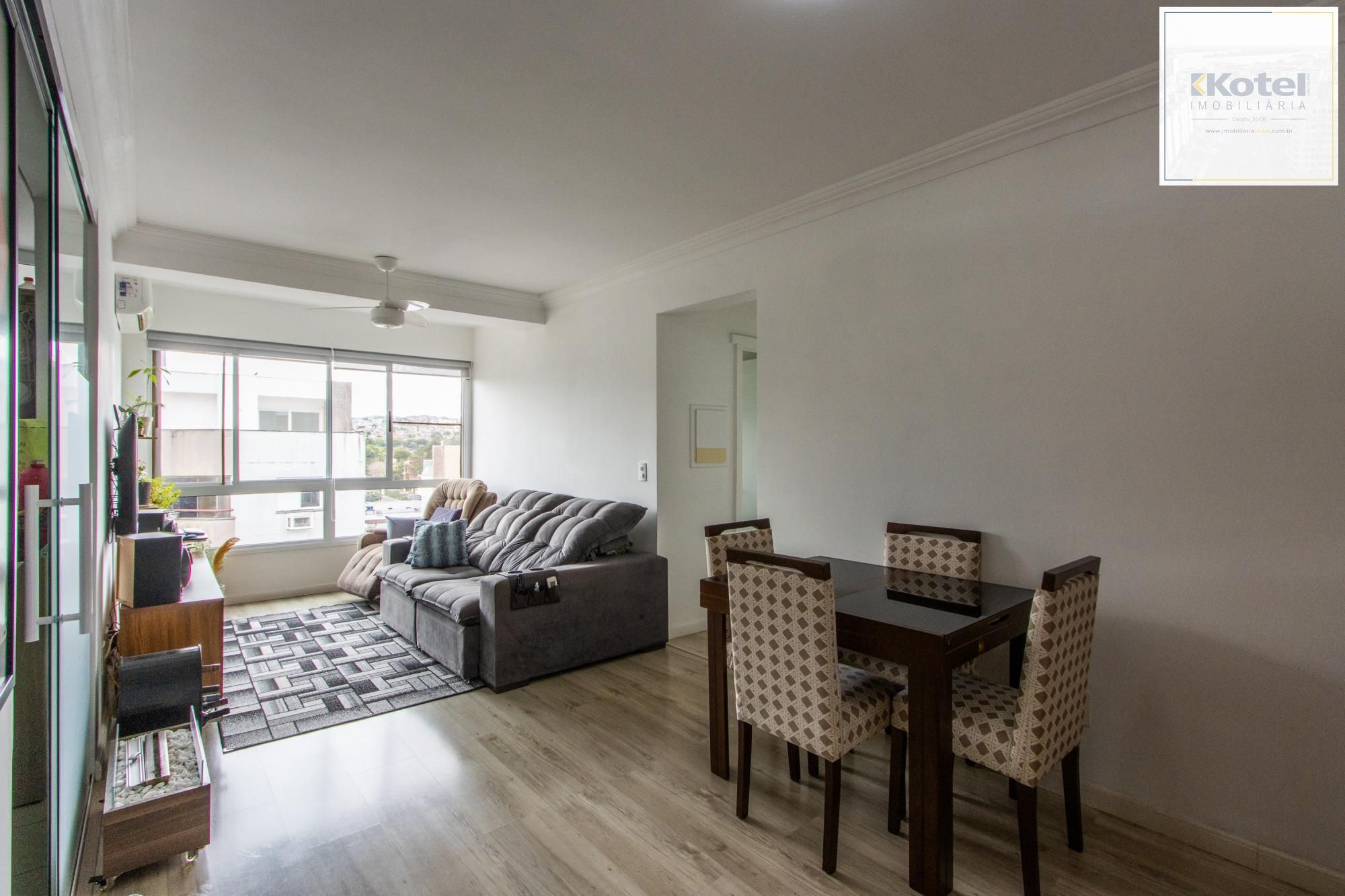 Apartamento de 2 quartos, living para 2 ambientes, cozinha com churrasqueira e 1 vaga de garagem coberta.