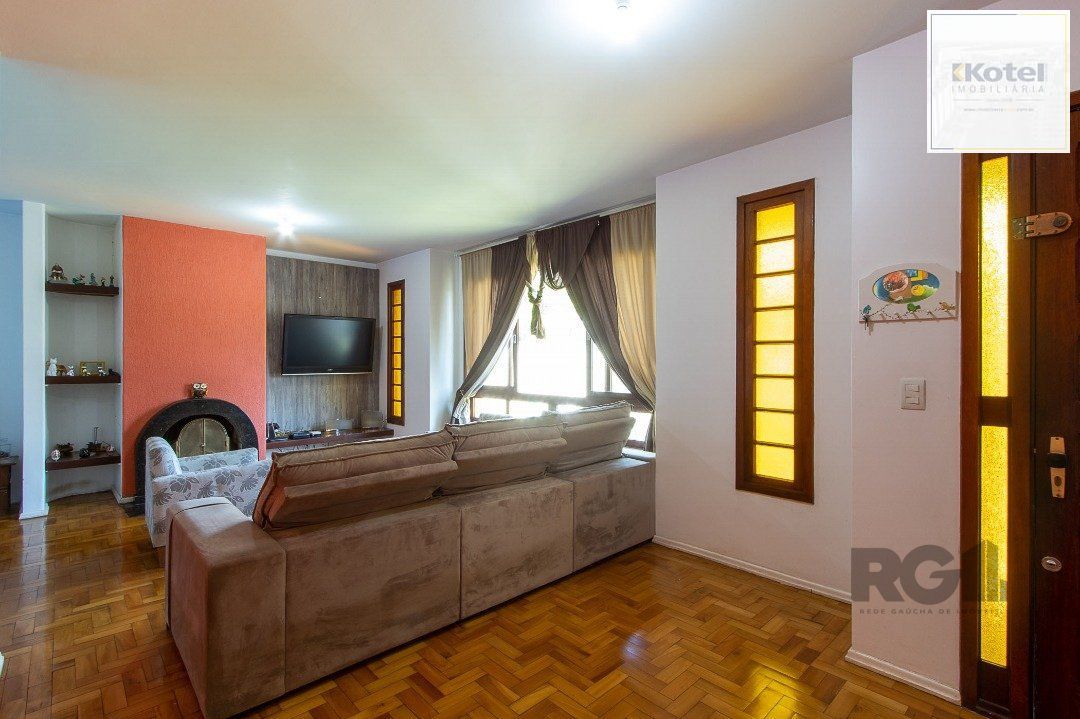 Casa térrea, com 3 dormitórios, 1 suíte, no bairro Ipanema. — foto 5