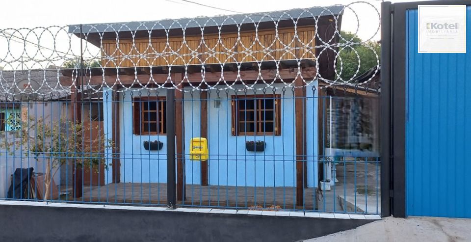Casa térrea de 2 dormitórios, living, cozinha, churrasqueira, área de serviço, banheiro social, vaga para 2 automóveis. — foto 4