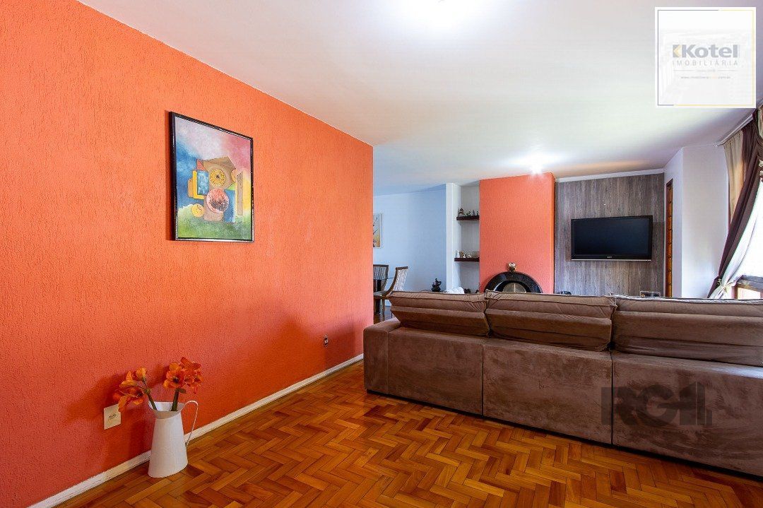 Casa térrea, com 3 dormitórios, 1 suíte, no bairro Ipanema. — foto 4