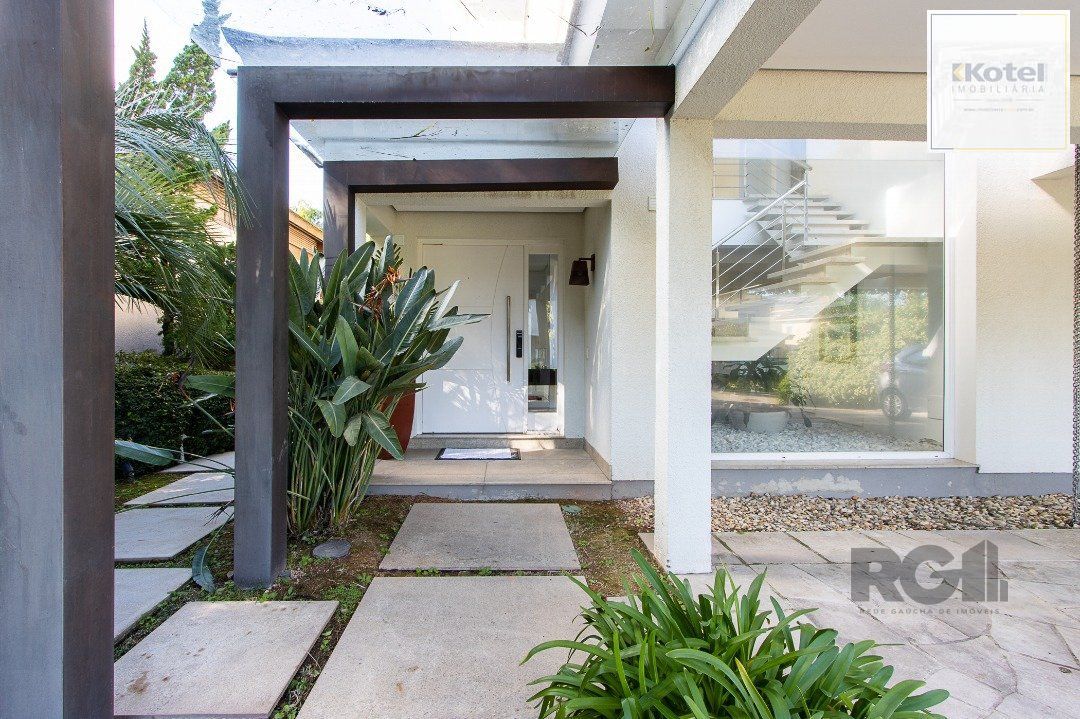 Casa no Condomínio Las Rocas, vista para o Guaíba, com 5 suítes — foto 4