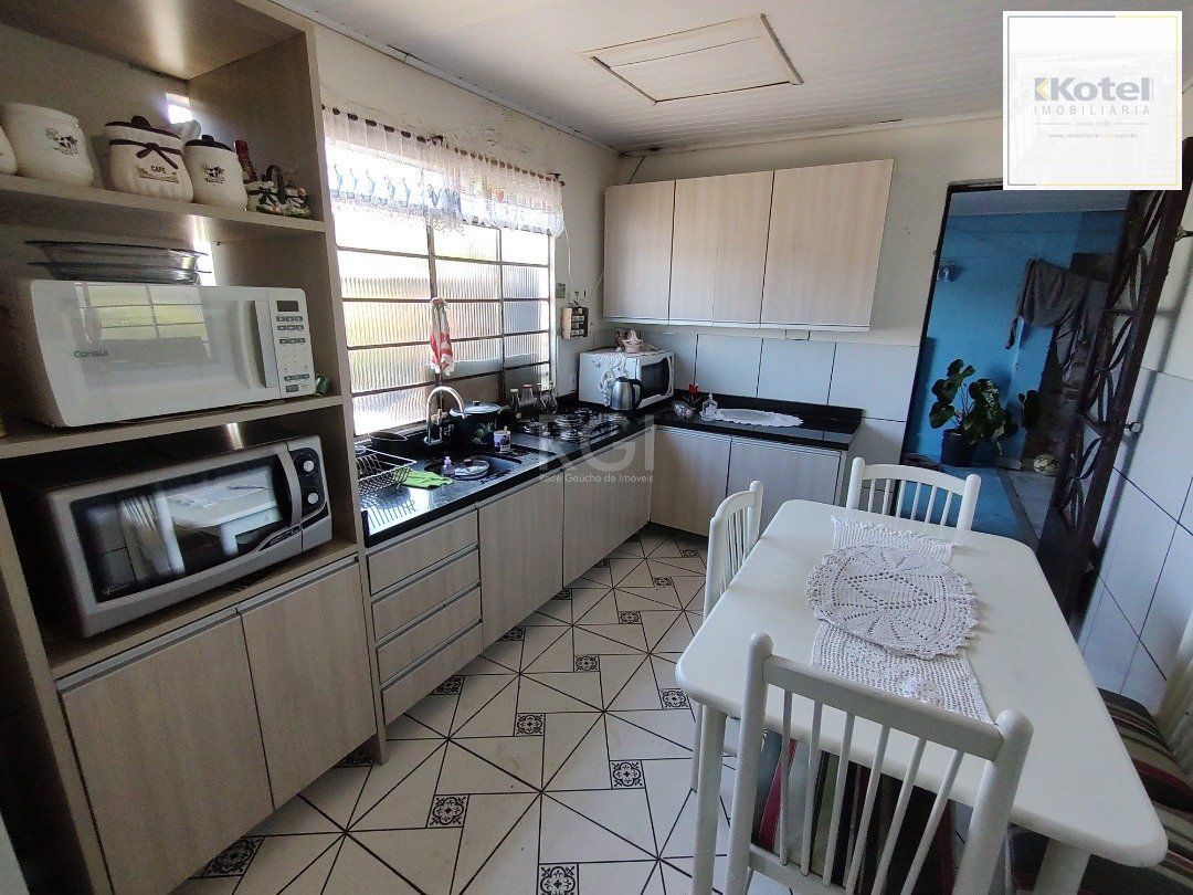 Casa para Venda - 100m², 3 dormitórios, 2 vagas - Lomba do Pinheiro — foto 5