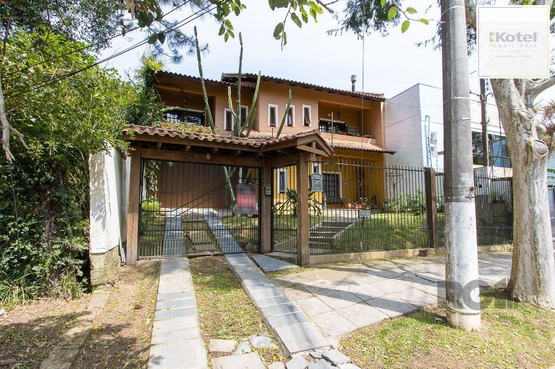 Casa para Venda - 300m², 3 dormitórios, sendo 1 suites, 4 vagas - Nonoai — foto 2