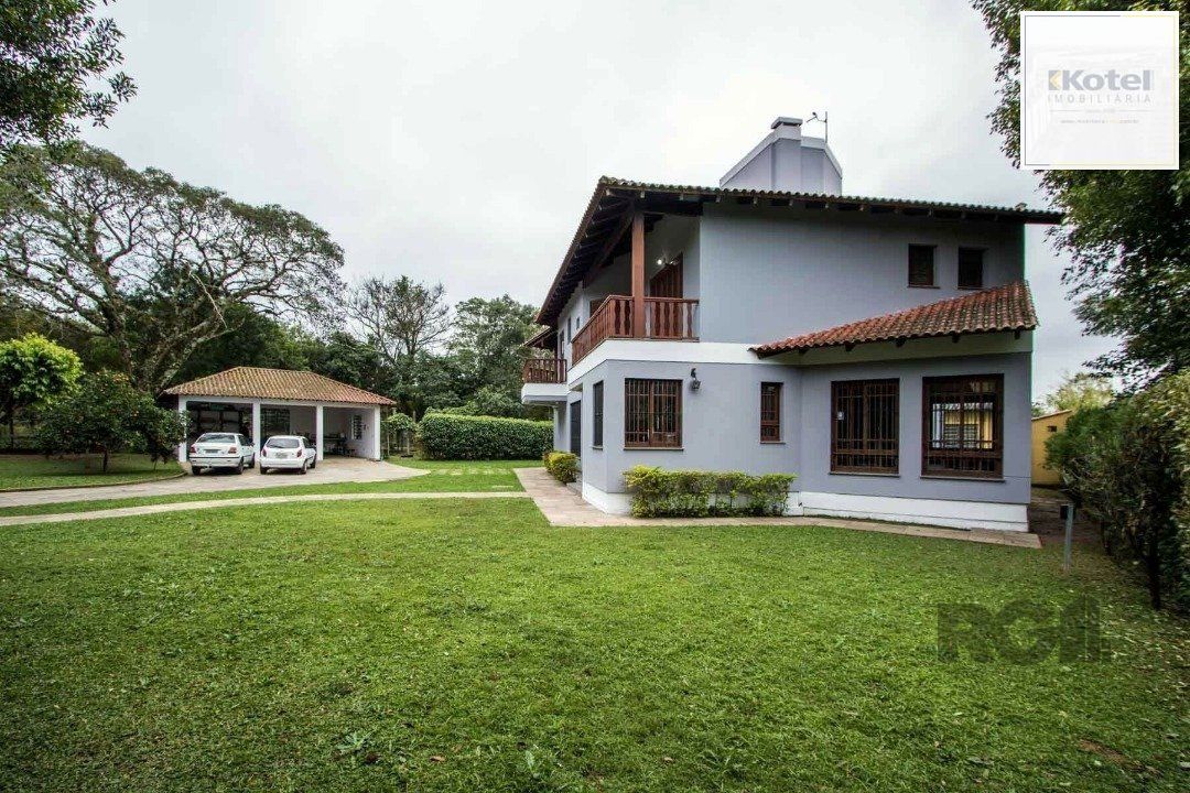 Sobrado com 6 suites, lareira, lavabo, pátio - Bairro Belém Velho — foto 2