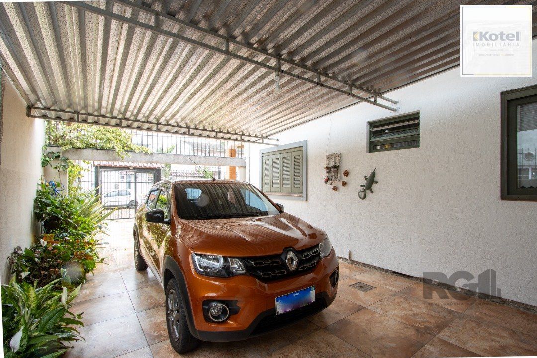 Casa térrea, 3 quartos, edícula, com 2 suites, pátio - Bairro Guarujá — foto 4