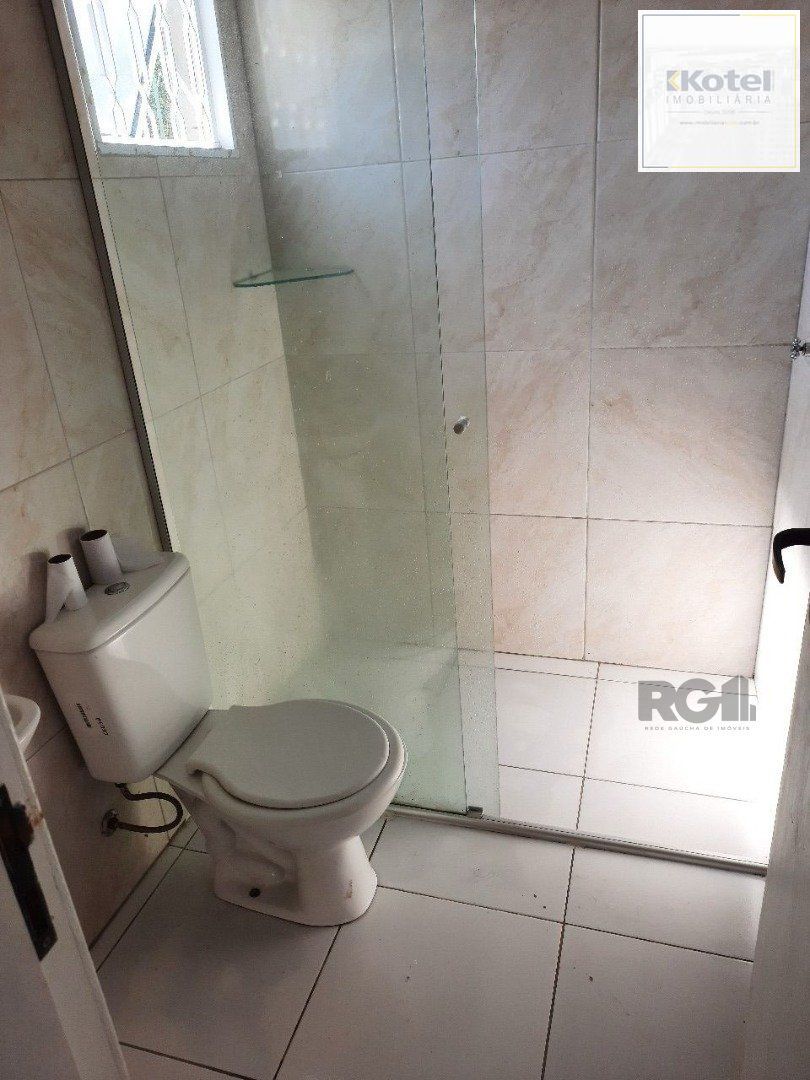 Oportunidade Imperdível: Prédio com 4 Apartamentos, Pátio e 2 Vagas de Garagem — foto 2